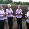 Members of Kinder prepare to ring in the bride at a local wedding